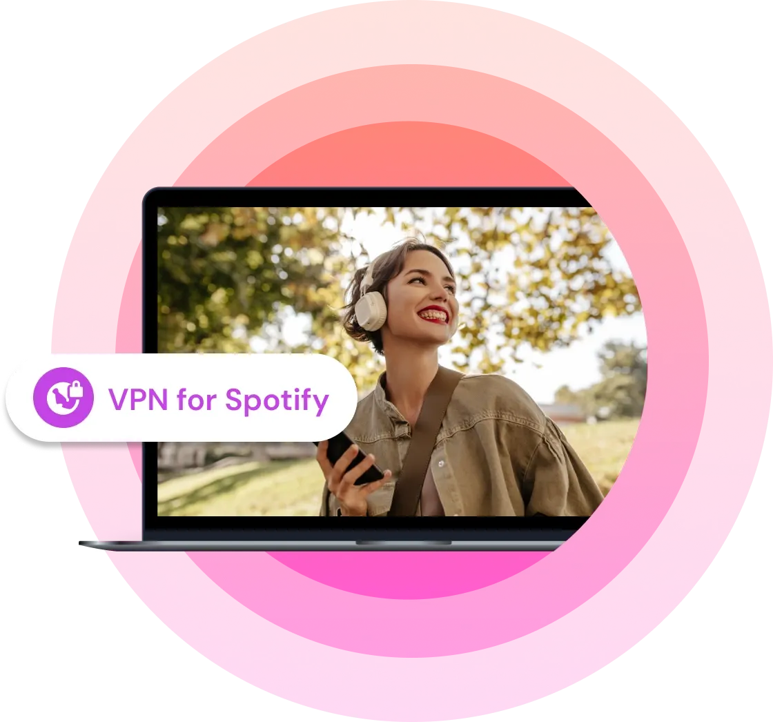 A woman listens to music outside